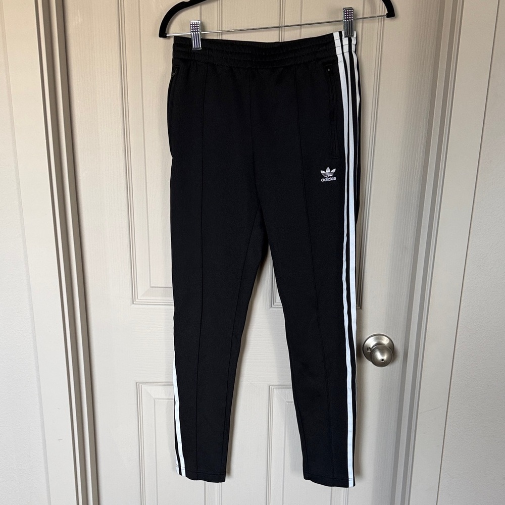 Adidas women’s Black Joggers with White Stripes